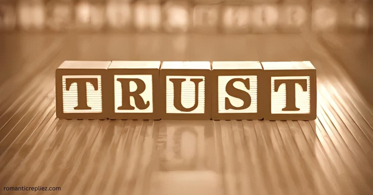 Trust spelled with wooden letter blocks on a wooden table.